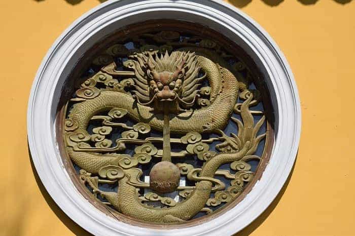Dragon is a symbol of wealth, power, and abundance. It was traditionally used as a symbol of the emperor. china window dragon sculpture min - 30 Feng Shui Products & Items: Meaning, Use, and Placement