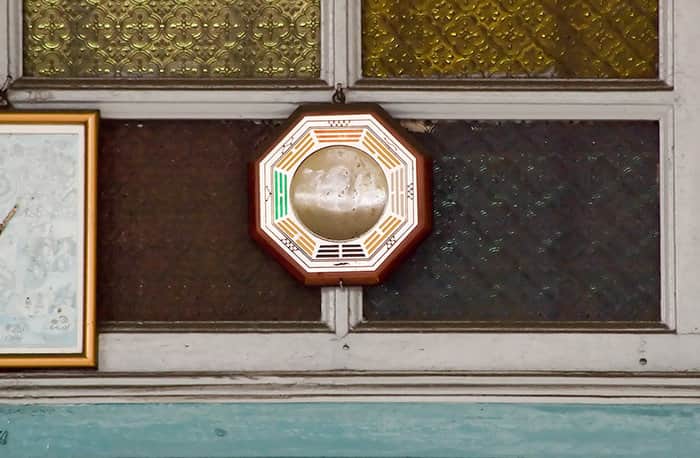 A Bagua mirror should only be used when it’s recommended by a Feng Shui expert. convex bagua mirror on window min - 30 Feng Shui Products & Items: Meaning, Use, and Placement