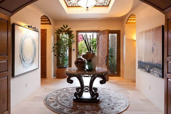 Though large plants are suitable close to the front door, this does not apply in every situation. entryway large plant next to front door - A Simple Guide to Feng Shui Indoor Plants