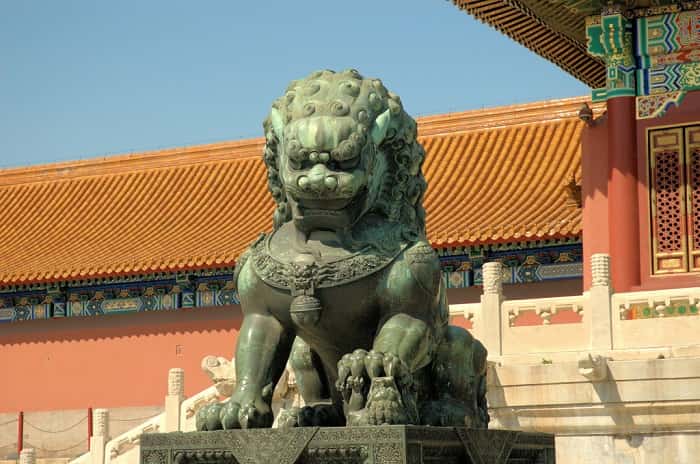 Lions (Fu Dogs) come in pairs. This image only shows one from the Forbidden City. Fu Dog in front of Forbidden City min - 30 Feng Shui Products & Items: Meaning, Use, and Placement