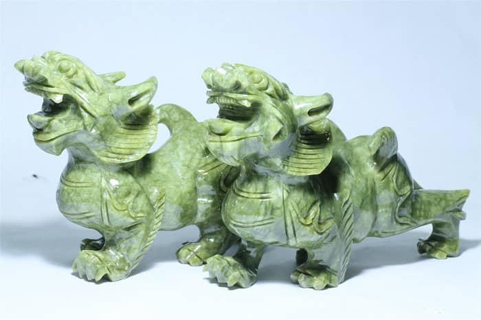 Pi Xiu is a heavenly creature resembling a winged lion. green jade pi xiu min - 30 Feng Shui Products & Items: Meaning, Use, and Placement