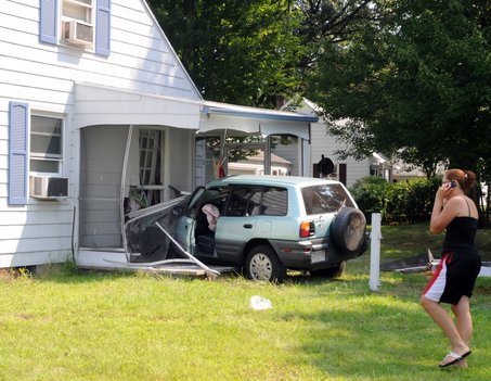 Houses facing a T-junction are more likely to be damaged by negligent drivers. Springfield- Staff Photo by Mark M.Murray. large CarCrash - Is the Feng Shui of Houses Facing T-Junction Really That Bad?