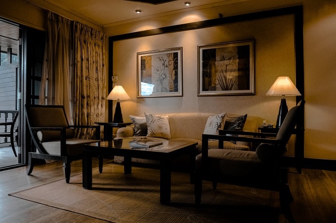 The living room should be a bright place, unlike the image above. living room dim lighting feng shui min - 27 Feng Shui Living Room Tips & Rules: Location, Design, Furniture, and Items