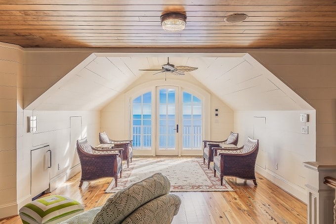 Slanted ceilings are NOT ideal if the end of the ceiling is too low, like the image above. living room slanted ceiling feng shui min - 27 Feng Shui Living Room Tips & Rules: Location, Design, Furniture, and Items