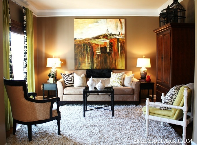 Hanging an artwork behind the sofa is NOT bad luck totally fine. living room sofa artwork hung on wall behind fen gshui min - 27 Feng Shui Living Room Tips & Rules: Location, Design, Furniture, and Items