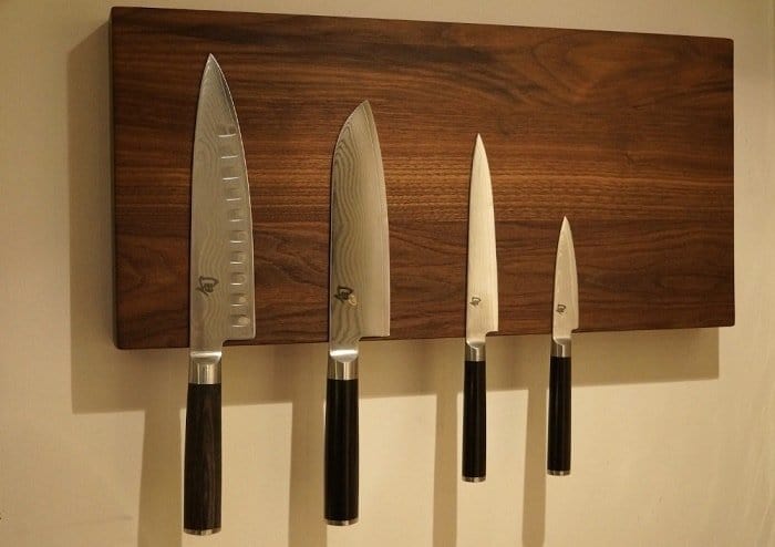 Organizing your knives in a magnetized knife block is not harmful or bad Feng Shui. Magnetic knife rack wooden plain sight feng shui kitchen knives min - 33 Kitchen Feng Shui Rules and Tips – Location, Stove, and Basics