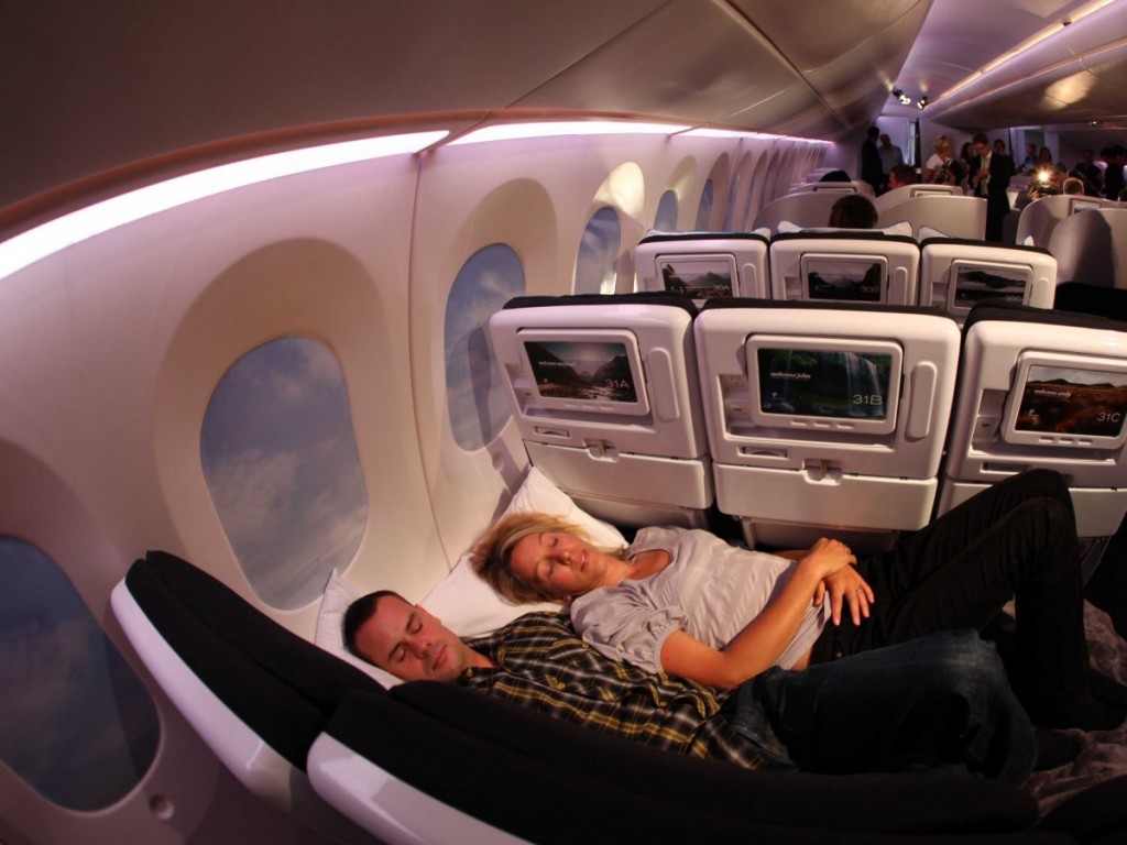 If you could lie down sleeping on a plane, would you sleep with your head on the side of the walkway? Sleeping on Plane 1024x768 - When Feng Shui Bed Placement Rules Conflict: Which Should You Use?