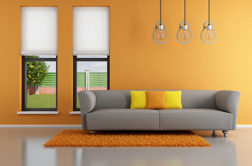 Feng shui suggest that sofa should be placed against a wall for maximum comfort. Tov Tov Fancy Orange Living Room wall and Sofa 1024x673 - Feng Shui Explained from a Modern Perspective