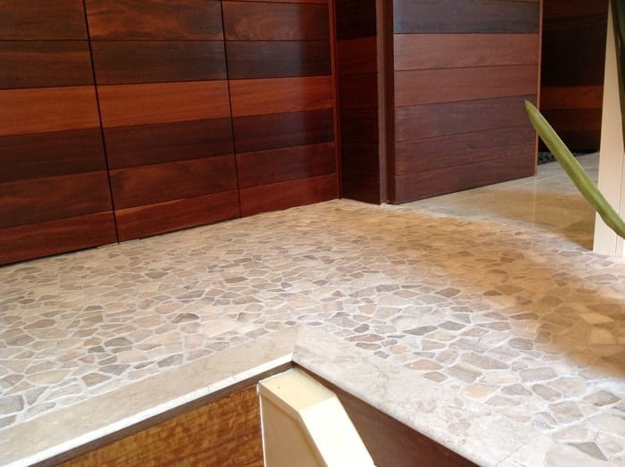 The flooring of the second level to suggest flowing water through undulating river. upstairs landing1 min - How a Small Change in Office Door Feng Shui Led to New Business Opportunities