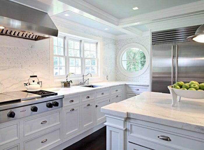 In this image, the stove and sink is at least two feet apart and would cause no clash between the Water and Fire Element. white kitchen sink next to stove 2 feet apart feng shui min - 33 Kitchen Feng Shui Rules and Tips – Location, Stove, and Basics